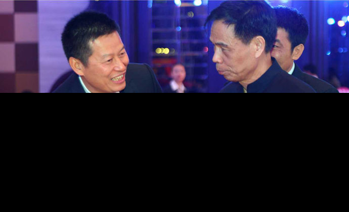 蔡耿锡副会长（左）与省工商联原书记杨浩明交谈.jpg
